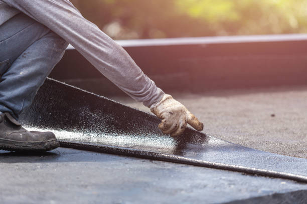 Professional Basement Waterproofing technician working in Troy, OH
